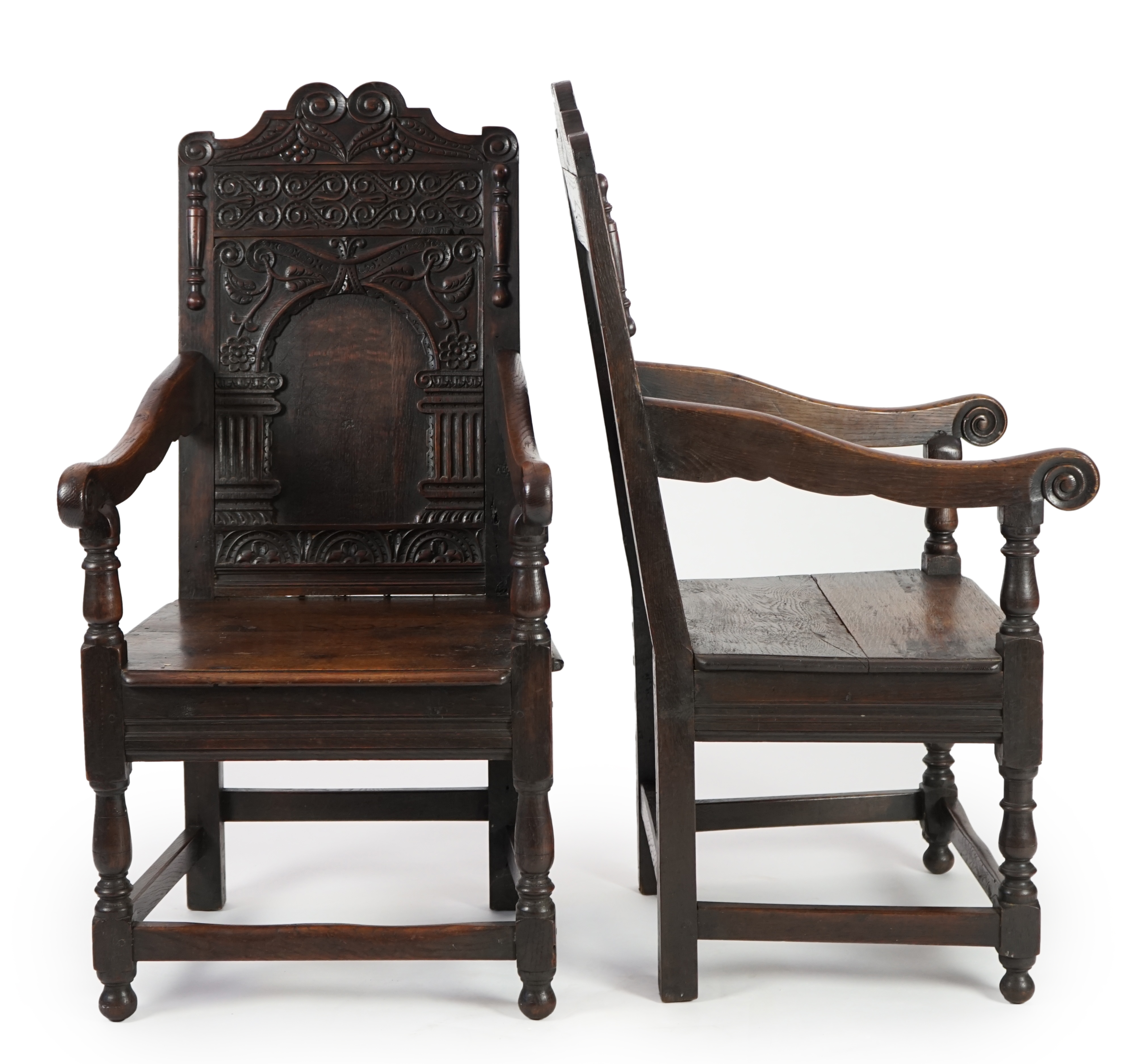 A pair of 17th century style oak Wainscot chairs